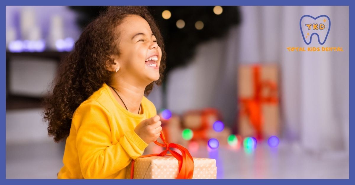 4 Tips to Keep Your Child's Smile Merry & Bright Photo